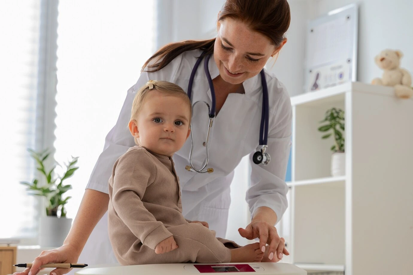 medium-shot-smiley-doctor-weighing-baby_23-2149728935